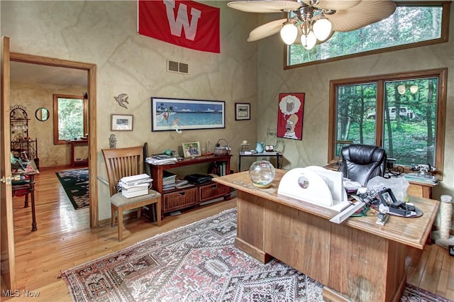 3366 Darrow Rd, Stow, OH 44224 - home office featuring a ceiling fan, wood finished floors, and plenty of natural light