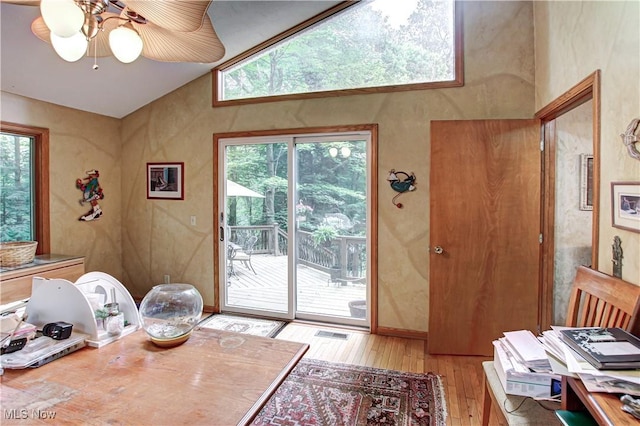 3366 Darrow Rd, Stow, OH 44224 - dining room featuring light wood finished floors, ceiling fan, and lofted ceiling