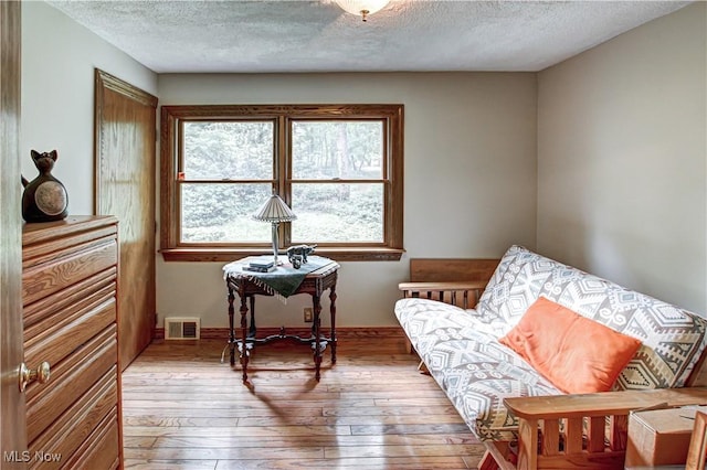 3366 Darrow Rd, Stow, OH 44224 - sitting room with wood-type flooring and a textured ceiling
