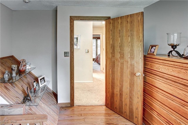 3366 Darrow Rd, Stow, OH 44224 - hallway with hardwood / wood-style floors and baseboards