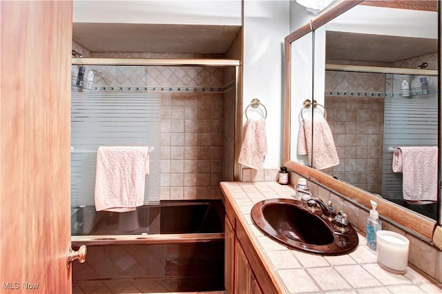 3366 Darrow Rd, Stow, OH 44224 - bathroom with vanity and tiled shower / bath combo