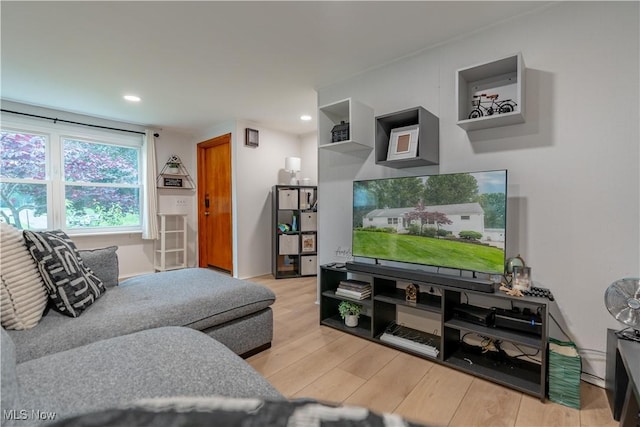 7080 Wren Ave NW, North Canton, OH 44720 - living room featuring light wood-style flooring and recessed lighting