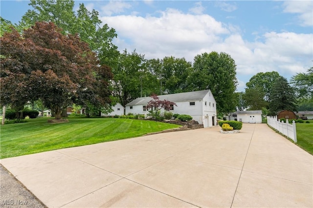 7080 Wren Ave NW, North Canton, OH 44720 - view of front facade featuring concrete driveway and an outdoor structure
