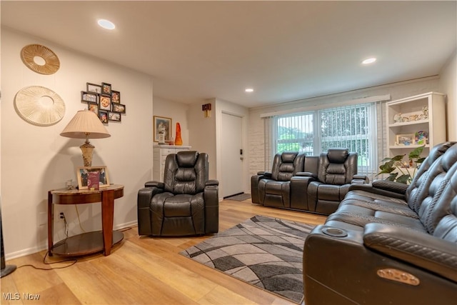 7080 Wren Ave NW, North Canton, OH 44720 - living area featuring light wood-type flooring and recessed lighting