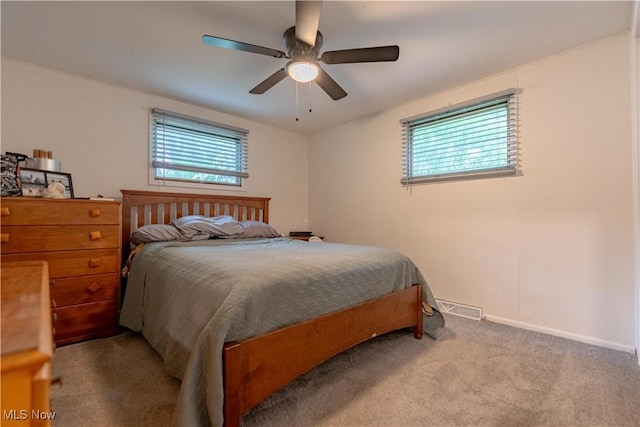 7080 Wren Ave NW, North Canton, OH 44720 - carpeted bedroom with ceiling fan and baseboards