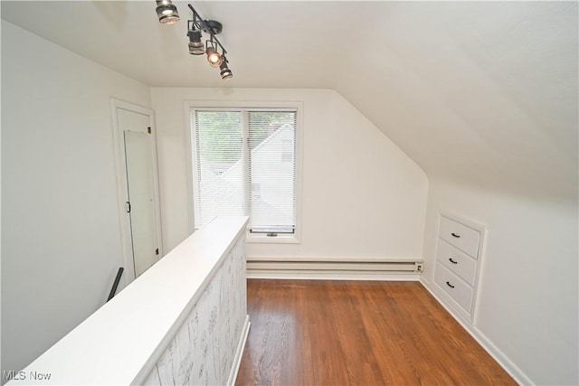 7673 N Lima Rd, Poland, OH 44514 - bonus room with dark wood-style flooring, vaulted ceiling, and a baseboard radiator