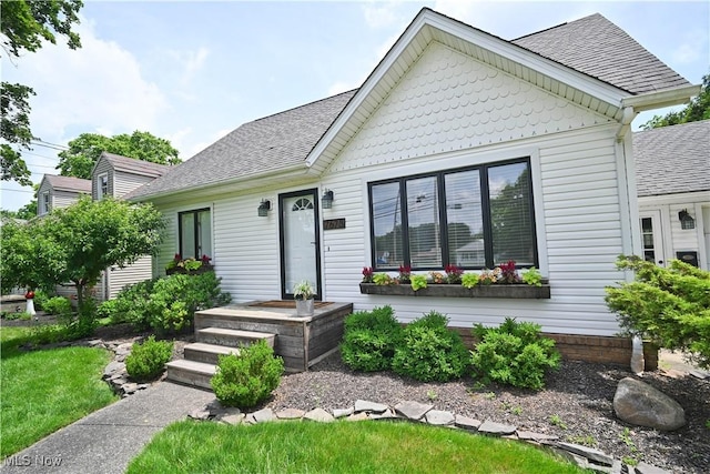 7673 N Lima Rd, Poland, OH 44514 - view of front of house with a shingled roof