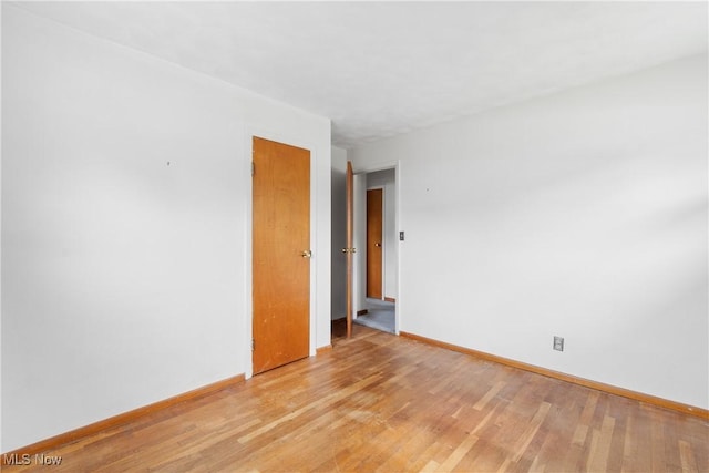285 Berwin Pl, Munroe Falls, OH 44262 - empty room with baseboards and light wood-type flooring