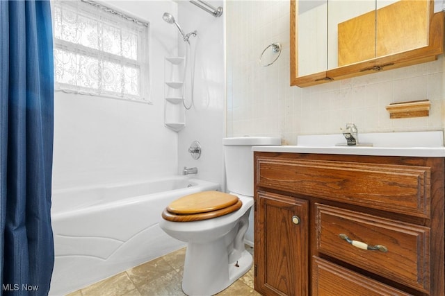 285 Berwin Pl, Munroe Falls, OH 44262 - bathroom featuring shower / bath combo, vanity, tasteful backsplash, and tile patterned flooring