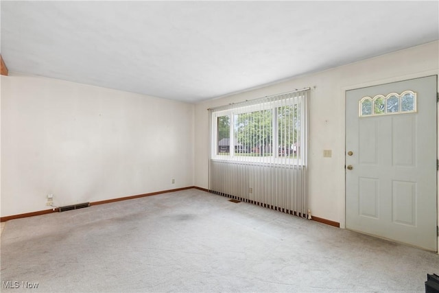 285 Berwin Pl, Munroe Falls, OH 44262 - carpeted foyer entrance with baseboards