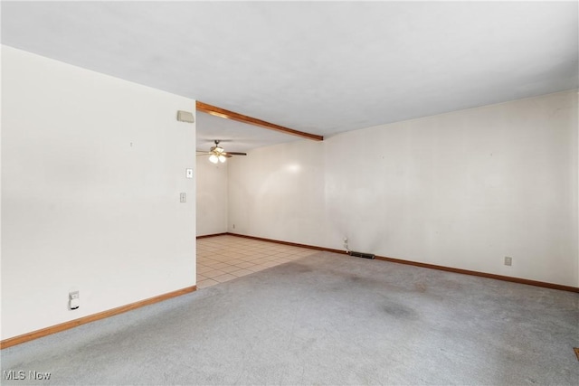 285 Berwin Pl, Munroe Falls, OH 44262 - carpeted spare room with a ceiling fan and tile patterned floors
