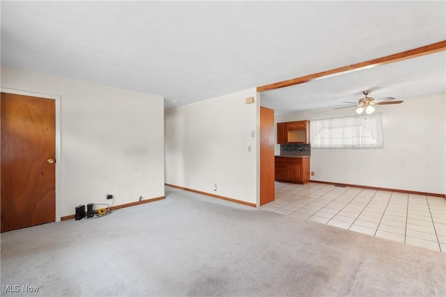 285 Berwin Pl, Munroe Falls, OH 44262 - spare room with a ceiling fan, light colored carpet, and light tile patterned flooring