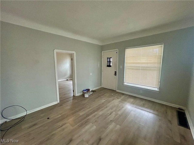 3180 W 90th St, Cleveland, OH 44102 - foyer with baseboards and wood finished floors