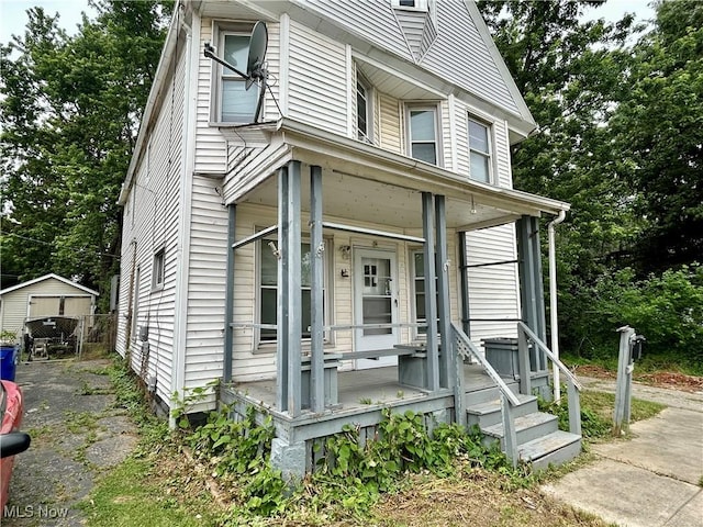 3180 W 90th St, Cleveland, OH 44102 - view of front facade with a porch