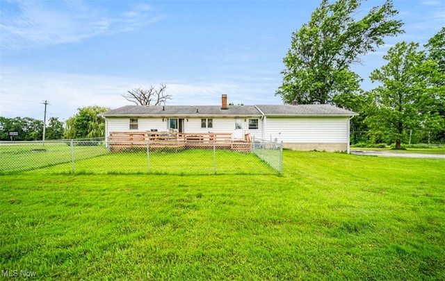 1518 State Route 46 N, Jefferson, OH 44047 - back of house with a deck, a fenced backyard, and a chimney