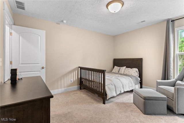 7733 Timber Ave, Hudson, OH 44236 - carpeted bedroom featuring a textured ceiling and baseboards
