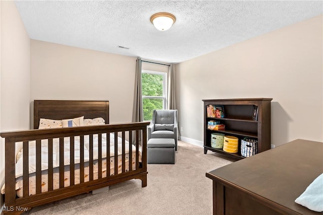 7733 Timber Ave, Hudson, OH 44236 - bedroom with carpet floors and a textured ceiling