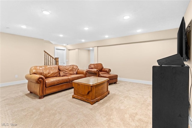 7733 Timber Ave, Hudson, OH 44236 - living room with light colored carpet, recessed lighting, and stairs