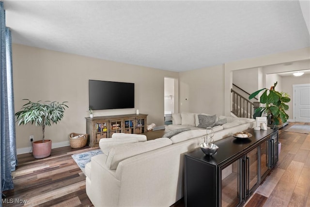 7733 Timber Ave, Hudson, OH 44236 - living room featuring wood finished floors and stairway