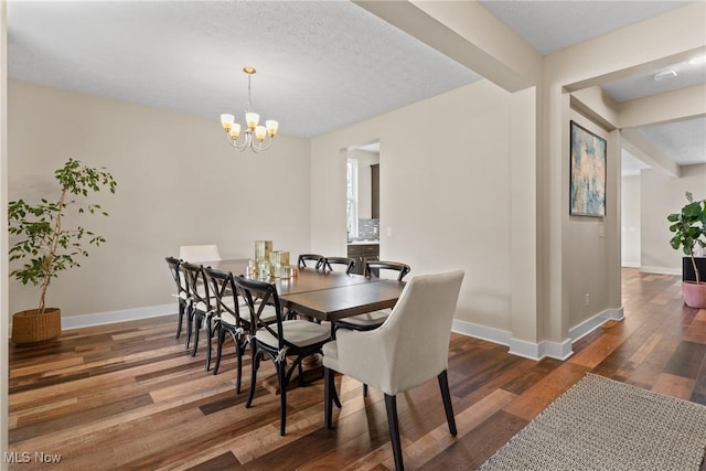 7733 Timber Ave, Hudson, OH 44236 - dining space featuring a chandelier and wood finished floors