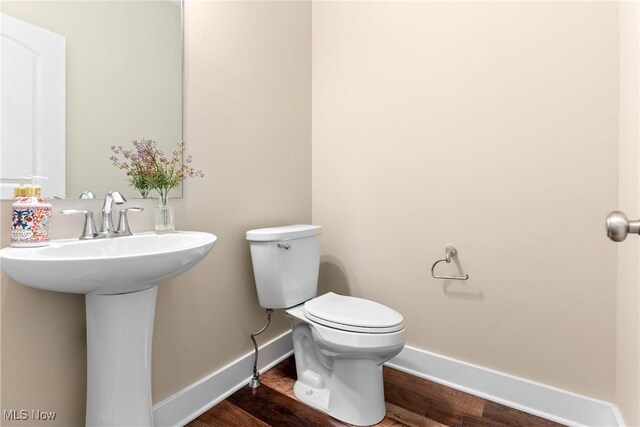 7733 Timber Ave, Hudson, OH 44236 - bathroom with baseboards and wood finished floors