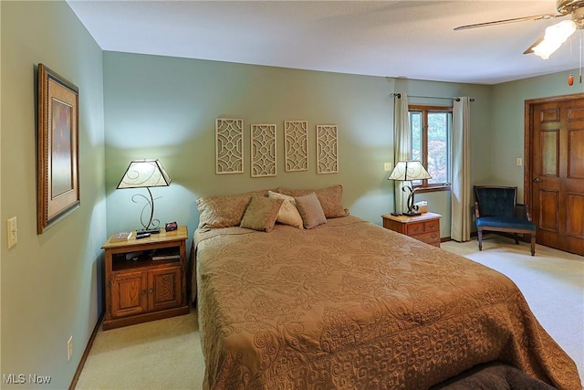 2307 Deerpath Dr, Sandusky, OH 44870 - bedroom with light colored carpet and ceiling fan