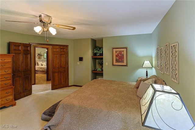 2307 Deerpath Dr, Sandusky, OH 44870 - bedroom featuring carpet floors and a ceiling fan