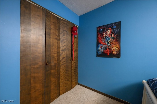2436 Woodlawn Dr NW, Dover, OH 44622 - bedroom featuring carpet and a textured ceiling
