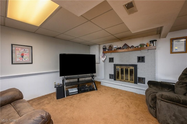 2436 Woodlawn Dr NW, Dover, OH 44622 - living area with carpet, a brick fireplace, and a drop ceiling