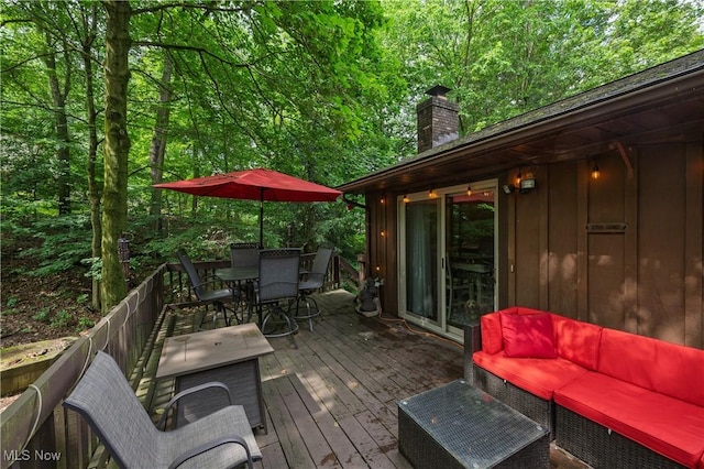 2436 Woodlawn Dr NW, Dover, OH 44622 - wooden terrace featuring outdoor dining space