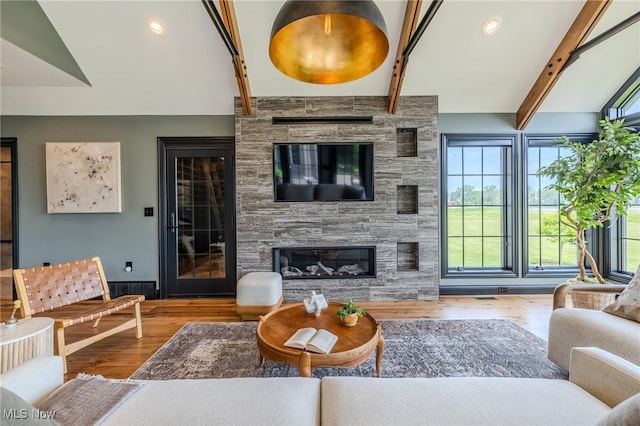 854 Crosstree Ln, Sandusky, OH 44870 - living area featuring wood finished floors, a large fireplace, and recessed lighting