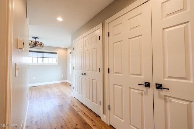 854 Crosstree Ln, Sandusky, OH 44870 - corridor featuring light wood-type flooring and recessed lighting