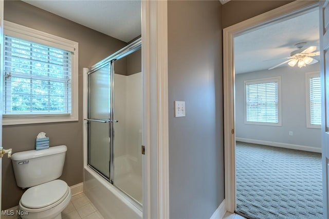 854 Crosstree Ln, Sandusky, OH 44870 - full bath featuring bath / shower combo with glass door, a ceiling fan, and tile patterned floors