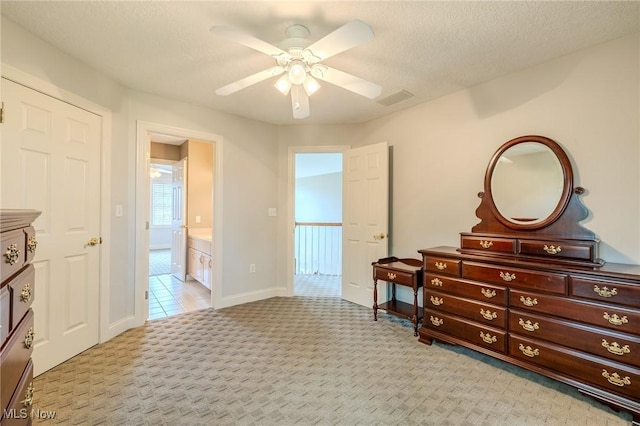 854 Crosstree Ln, Sandusky, OH 44870 - bedroom with light colored carpet, a ceiling fan, and a textured ceiling