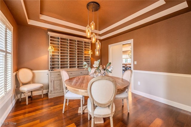 854 Crosstree Ln, Sandusky, OH 44870 - dining room with wood finished floors and a tray ceiling