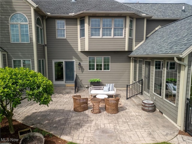 854 Crosstree Ln, Sandusky, OH 44870 - rear view of property with entry steps, a patio area, and roof with shingles