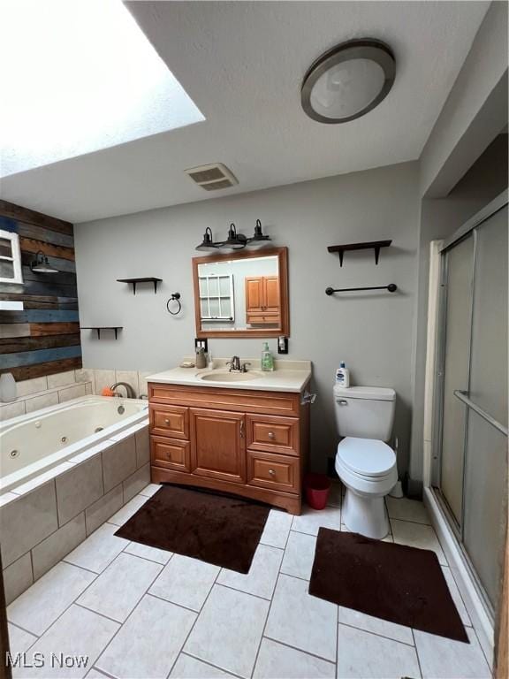 3290 NW Sweitzer St NW, Uniontown, OH 44685 - full bathroom with vanity, tile patterned floors, a whirlpool tub, and a stall shower