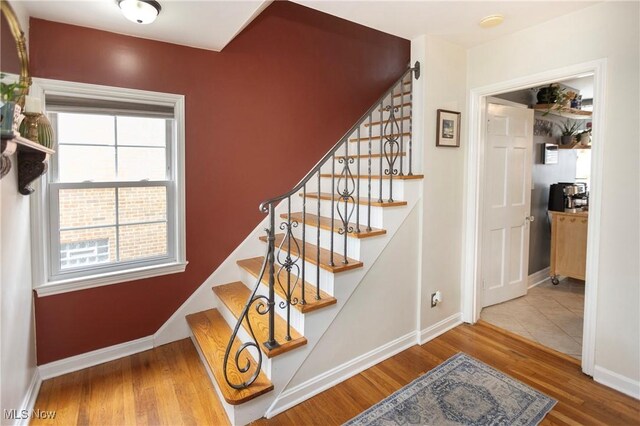 3678 Lynnfield Rd, Shaker Heights, OH 44122 - stairway featuring wood finished floors and baseboards