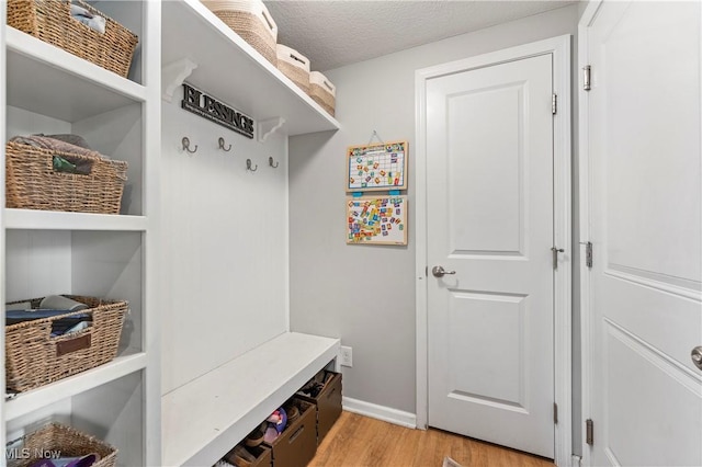2979 Cloverhurst St NE, Canton, OH 44721 - mudroom featuring light wood-type flooring and baseboards