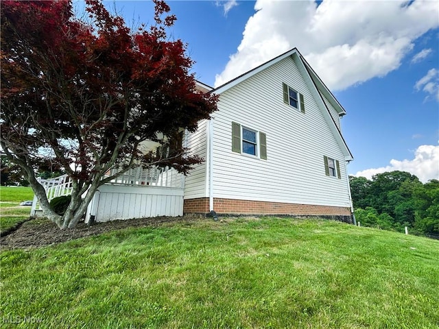 3585 Hayfield Rd, Dresden, OH 43821 - view of property exterior with a lawn