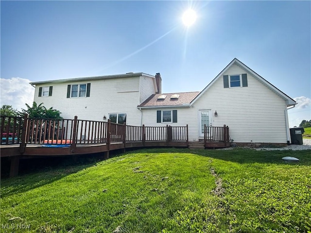 3585 Hayfield Rd, Dresden, OH 43821 - back of house with a wooden deck and a lawn