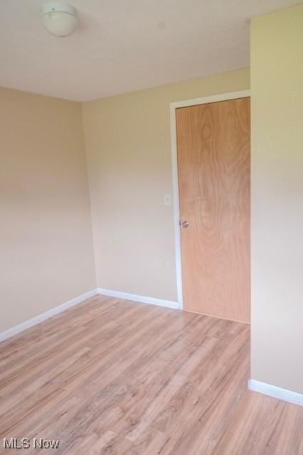 503 W Pidgeon Rd, Salem, OH 44460 - spare room featuring wood finished floors and baseboards