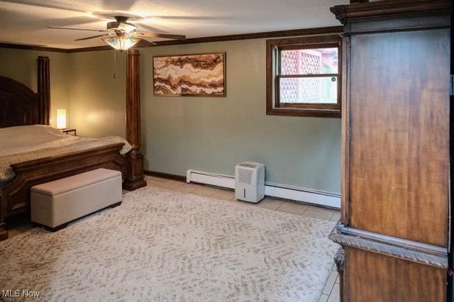 503 W Pidgeon Rd, Salem, OH 44460 - tiled bedroom with baseboard heating, ornamental molding, and a ceiling fan