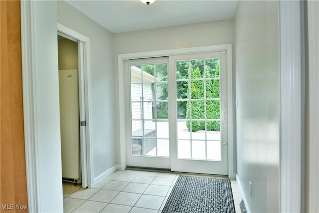2878 Beaver Trl, Cortland, OH 44410 - doorway to outside with light tile patterned floors and baseboards