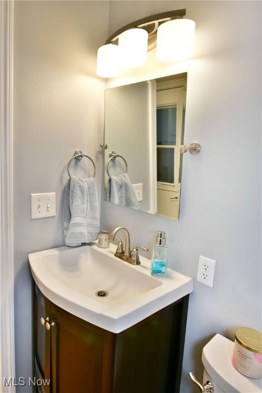 2878 Beaver Trl, Cortland, OH 44410 - half bathroom with vanity and toilet