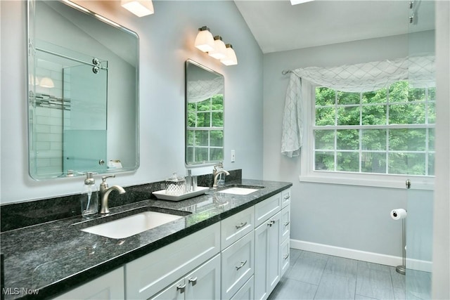 2878 Beaver Trl, Cortland, OH 44410 - full bathroom featuring double vanity and lofted ceiling