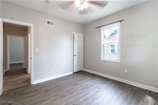 5458 Ridgewood, Lorain, OH 44055 - unfurnished bedroom featuring wood finished floors and a ceiling fan