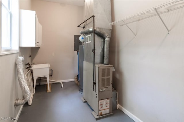 5458 Ridgewood, Lorain, OH 44055 - utility room with heating unit and water heater