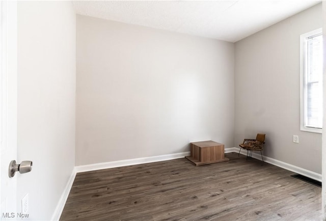 5458 Ridgewood, Lorain, OH 44055 - empty room with wood finished floors and baseboards