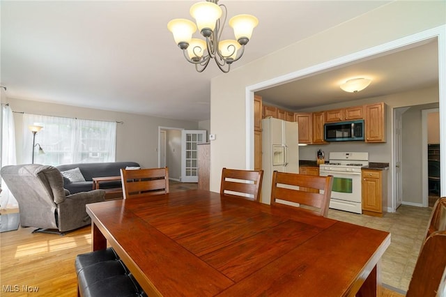 3975 Eastway Rd, South Euclid, OH 44118 - dining area featuring a chandelier